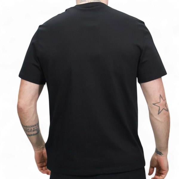 Camiseta Calvin Klein Hero Monogram Negra Calvin Klein | Camisetas  - Estilo urbano premium