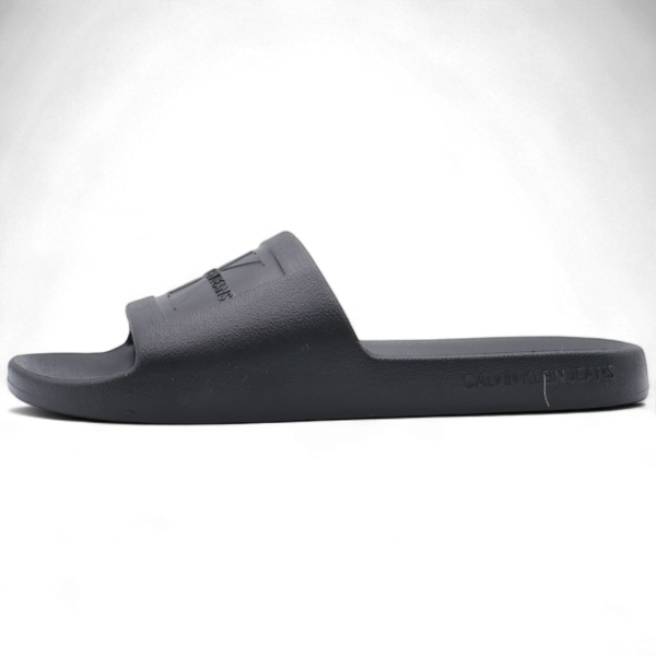 Chanclas Calvin Klein Monograma Devossed Negro Calvin Klein | Calzado  - Estilo urbano premium