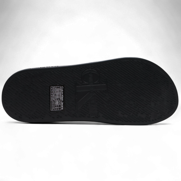 Chanclas Calvin Klein Monograma Devossed Negro Calvin Klein | Calzado  - Estilo urbano premium